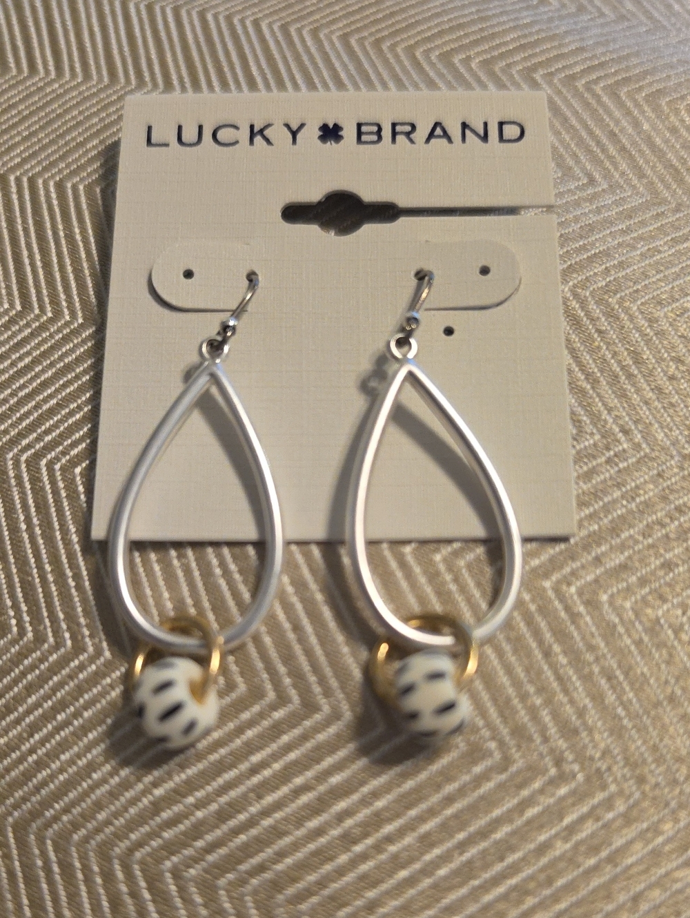 Lucky Brand White and Gold Open Teardrop Earrings with Bead